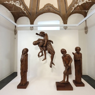 The white wall of the recently reopened venue provides a nice contrast to the religious wooden figures. Deposition wood ascribed to the 14th – 15th century.